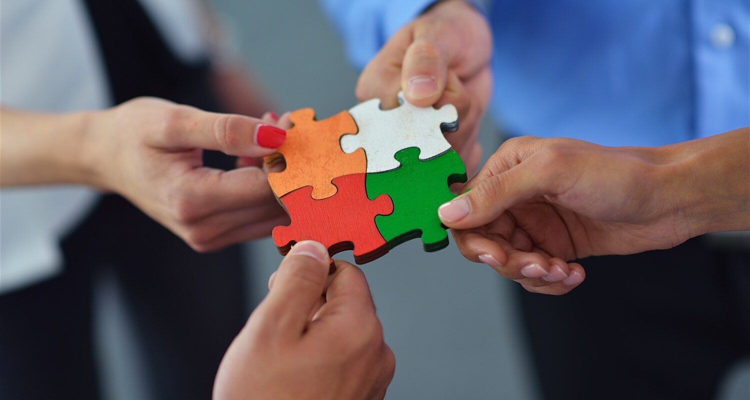 bigstock-group-with-puzzle-pieces